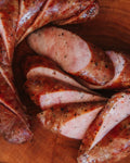 Garlic pepper smoked sausage, sliced on the bias