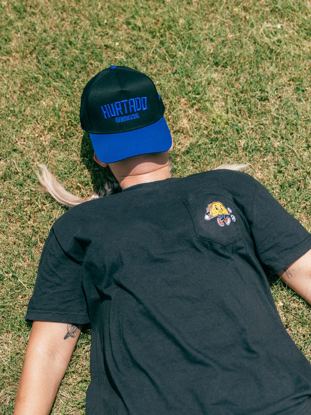 Soccer Taco Tee in black, worn, chest pocket detail