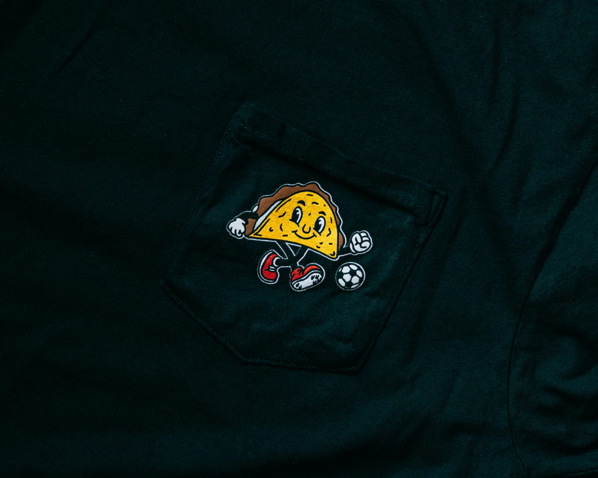 Soccer Taco Tee in black, close-up of the chest-pocket taco mascot