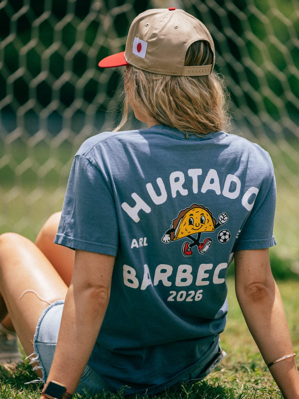 Soccer Taco Tee in faded blue, back badge worn