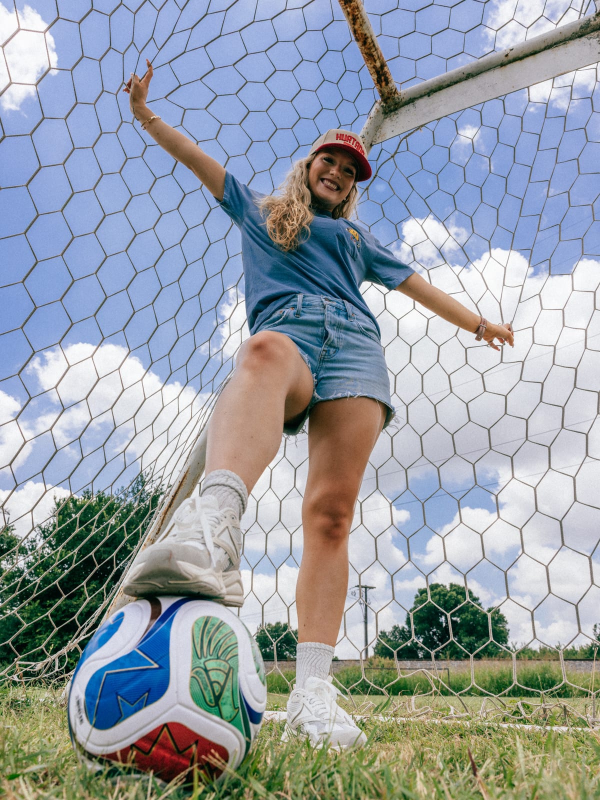 Soccer Taco Tee in faded blue, chest print, on the field