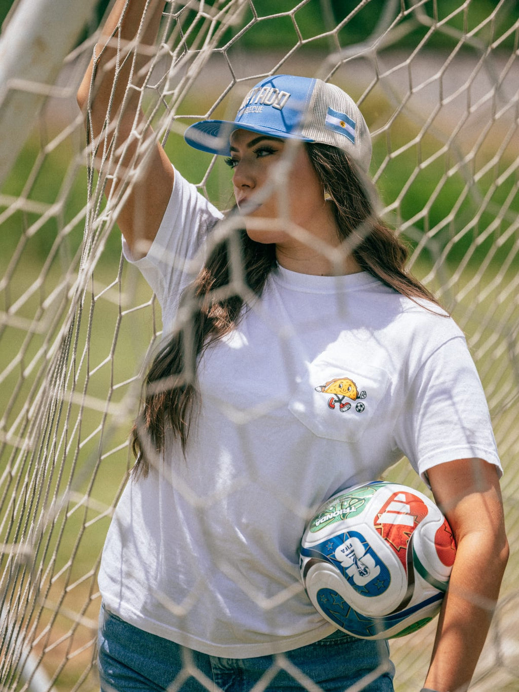 Soccer Taco Tee in white, worn at the goal