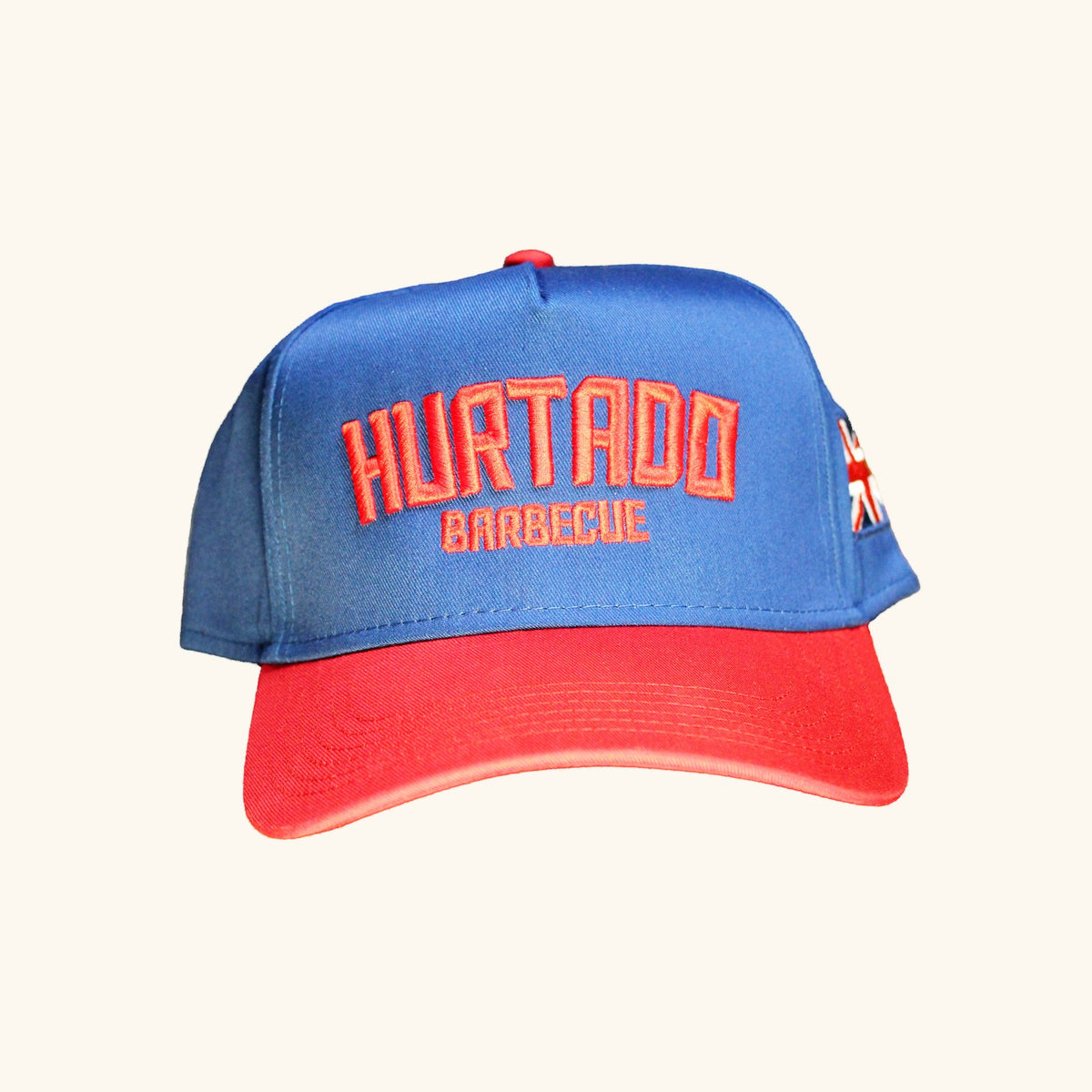 United Kingdom Snapback in royal blue with a red brim, front view
